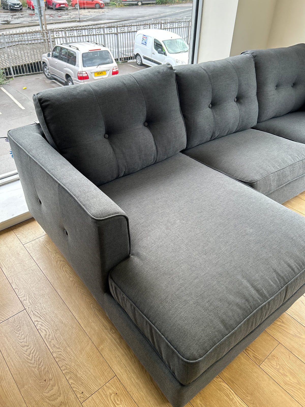 Ex-Display Liam Grey Fabric 3 Seater Chaise Sofa + Chair
