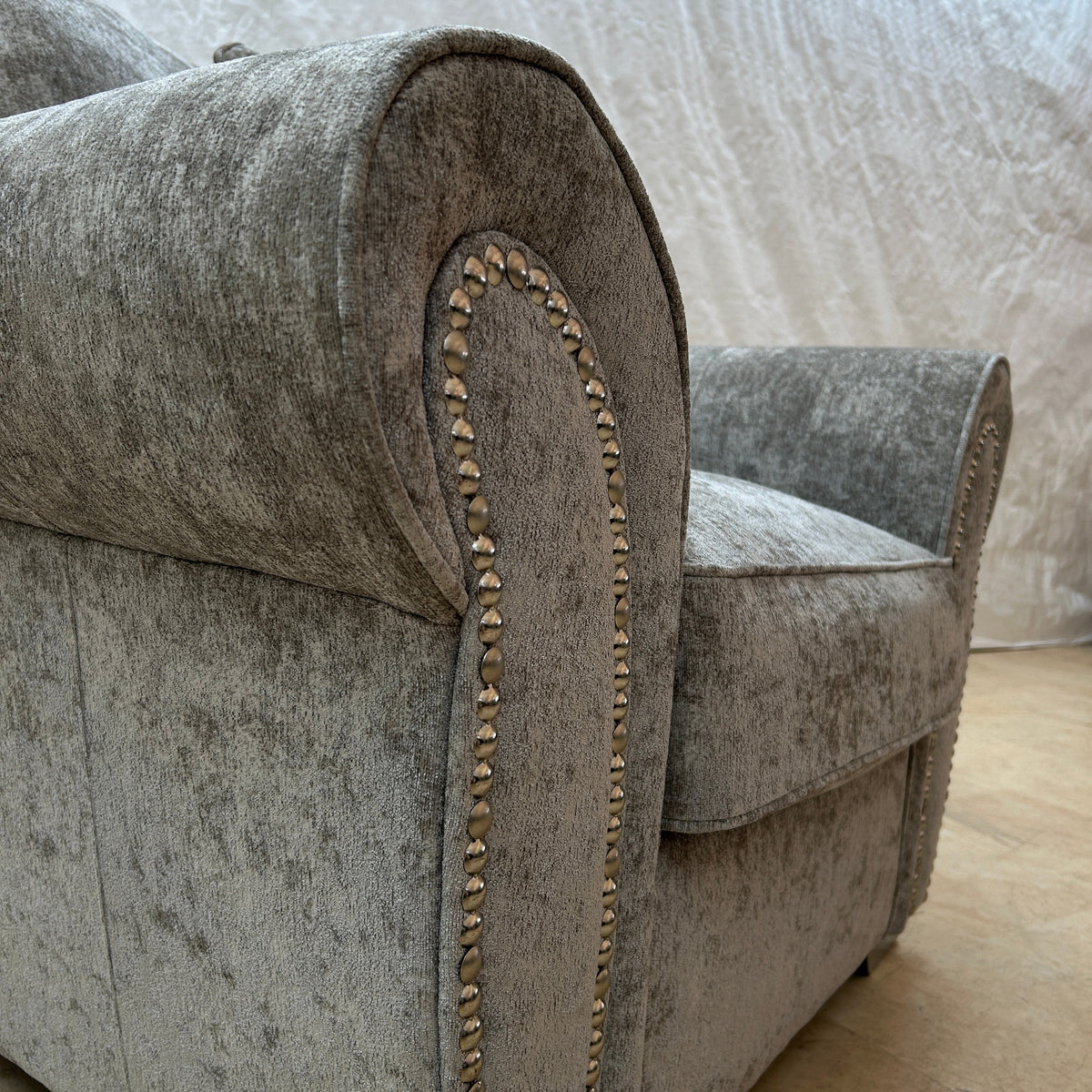 Ex-Display Grey Fabric Armchair with Scroll Arms and Studs