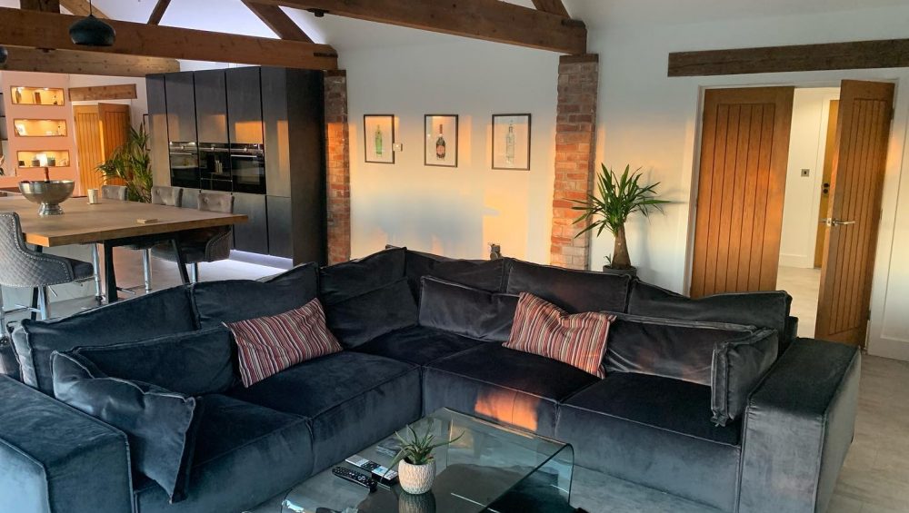 Where to place a corner sofa in a living space