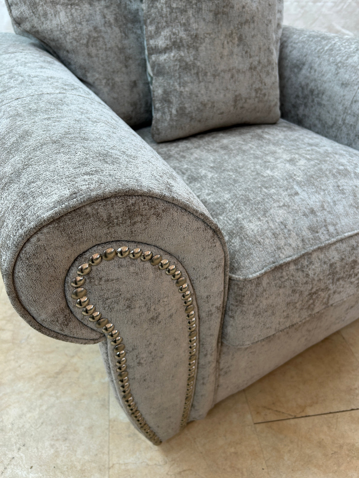 Ex-Display Grey Fabric Armchair with Scroll Arms and Studs